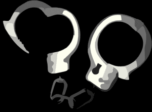 a pair of handcuffs, one of which is unlocked, signifying freedom